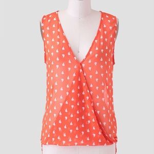 Breezy orange sleeveless top, sailboat detail